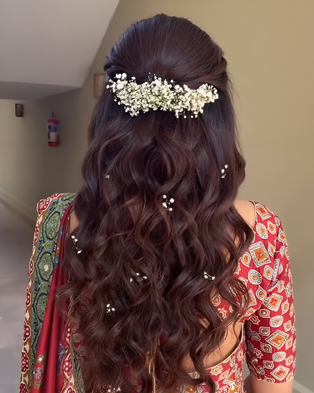 Long wavy hair with floral accessory