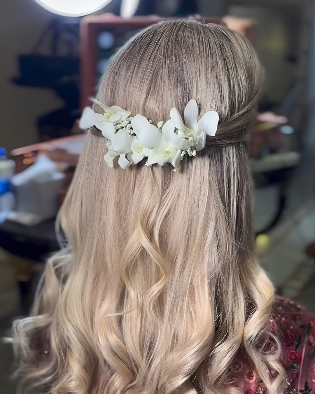 Long hair adorned with white flowers